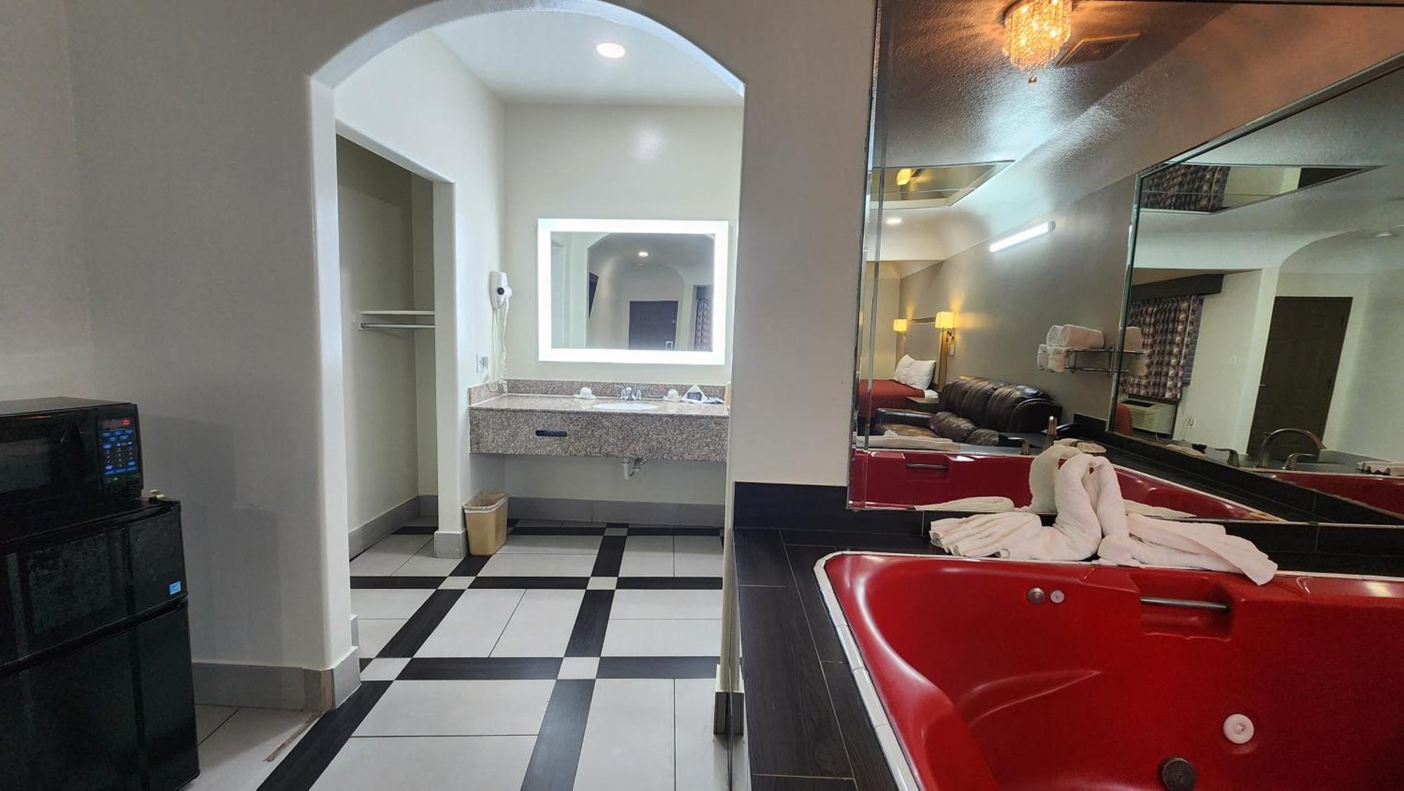 Scottish Inn & Suites Sam Houston Parkway المظهر الخارجي الصورة