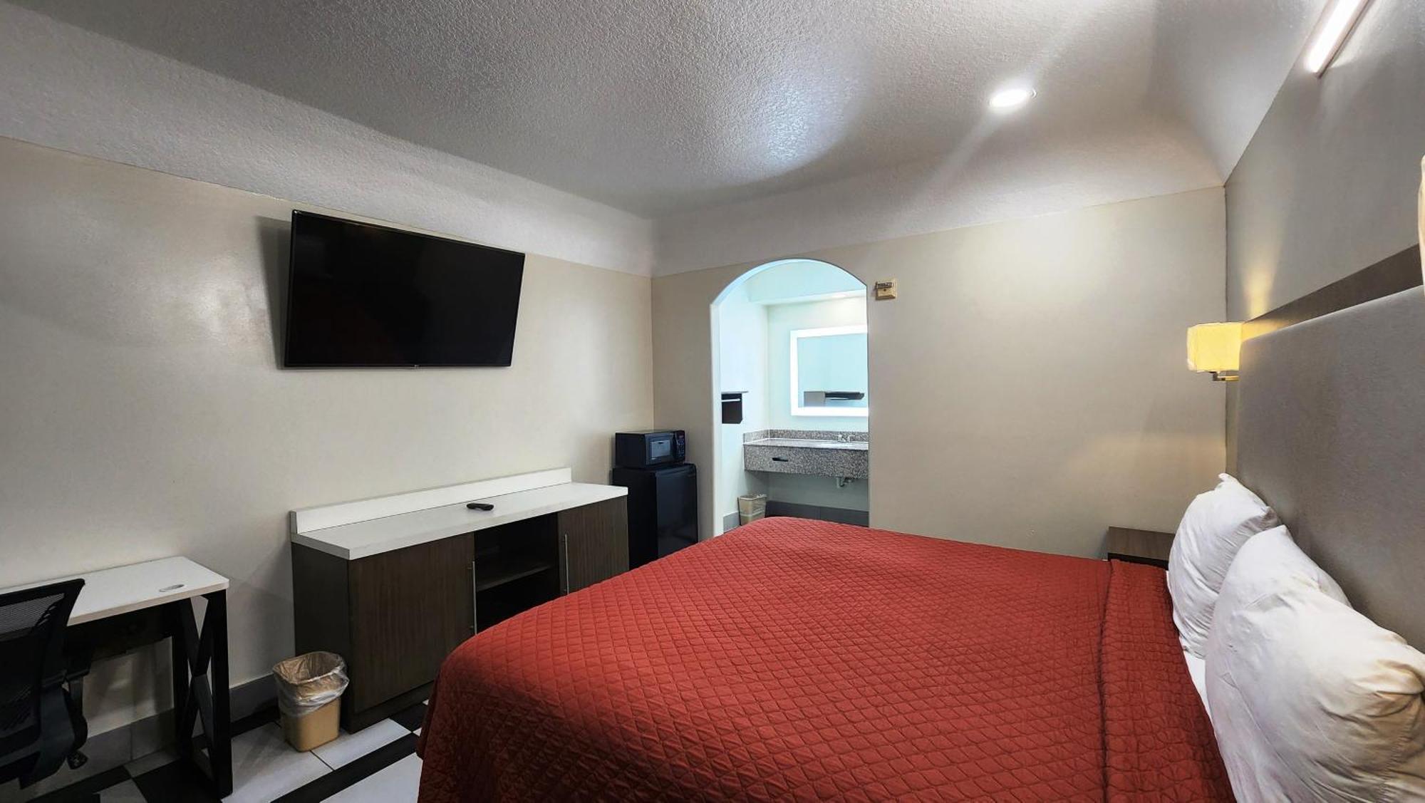 Scottish Inn & Suites Sam Houston Parkway المظهر الخارجي الصورة