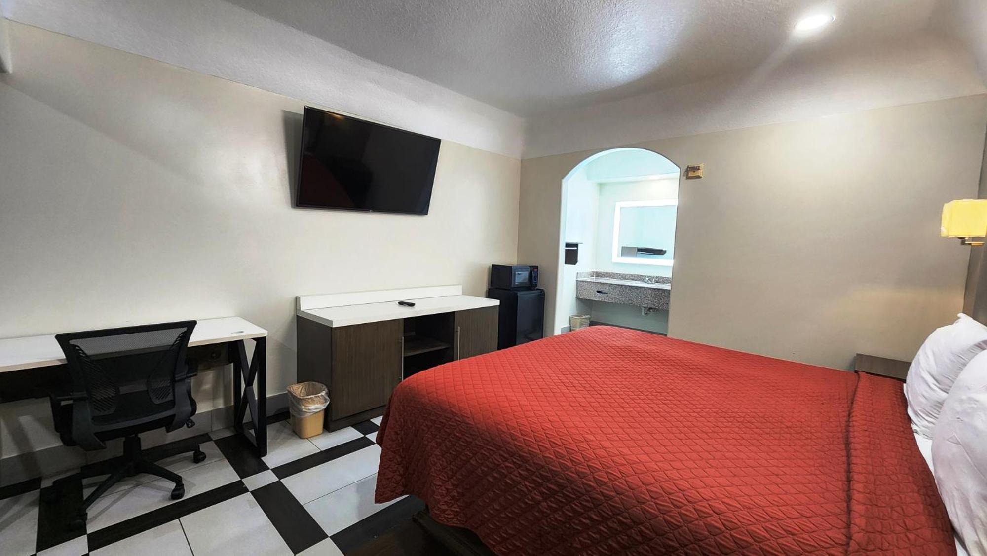 Scottish Inn & Suites Sam Houston Parkway المظهر الخارجي الصورة